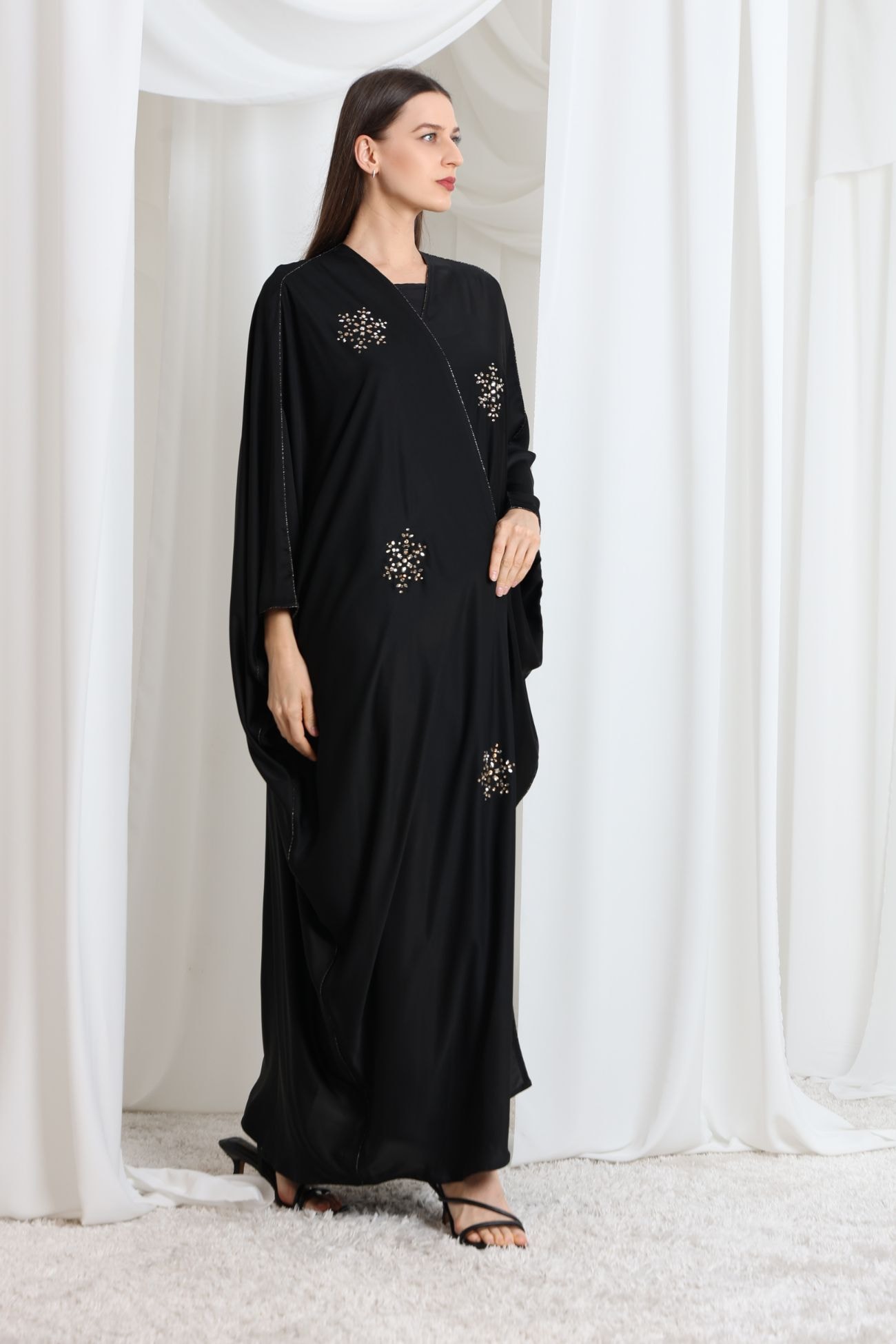 Black butterfly-cut abaya embellished with Gold Swarovski crystal