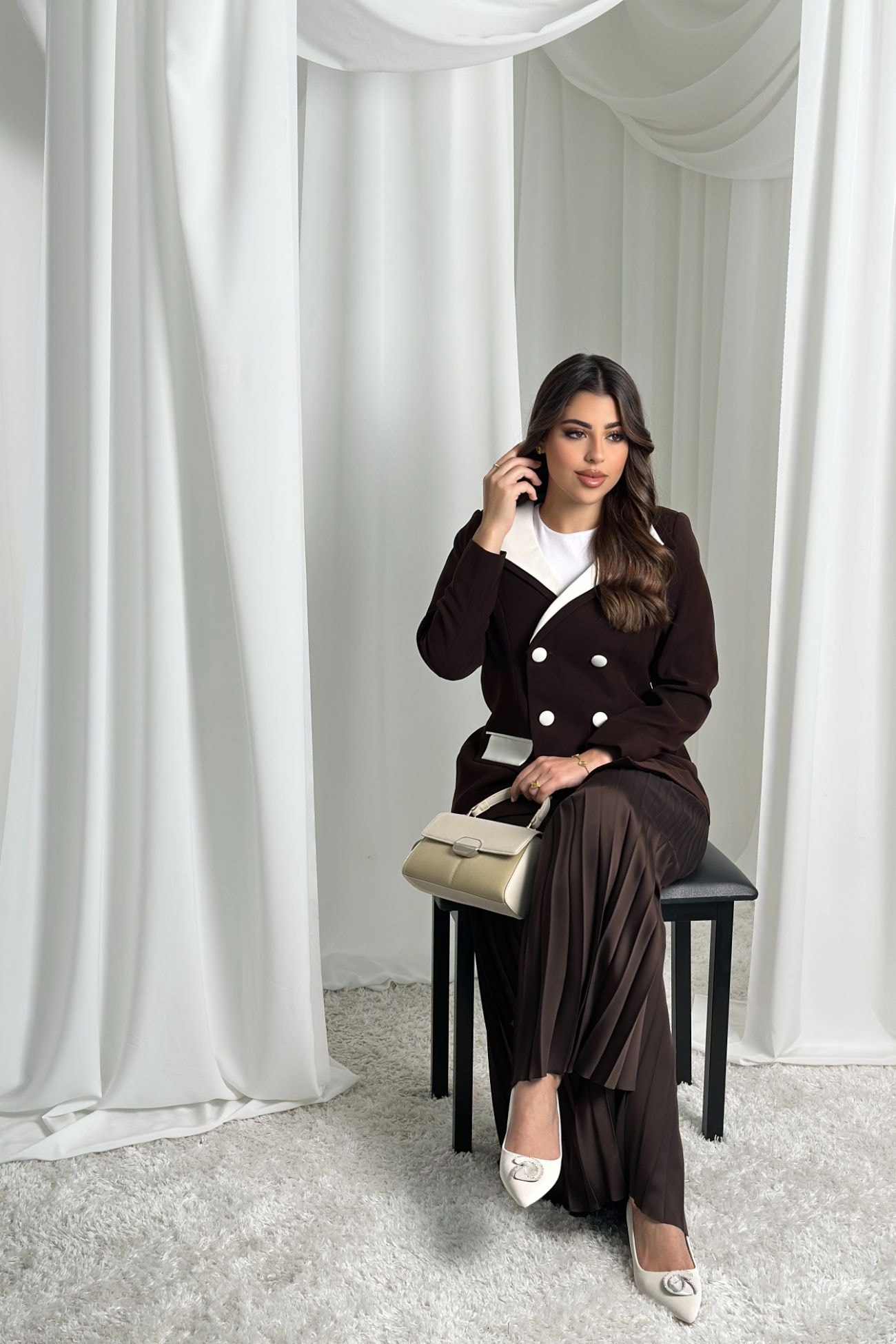Asymmetric blazer and cloche pleating pants